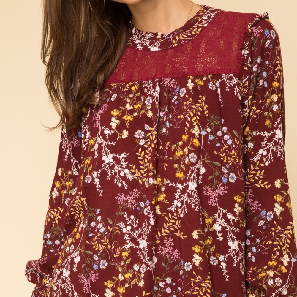 Ruffle mock neck lace inset printed blouse